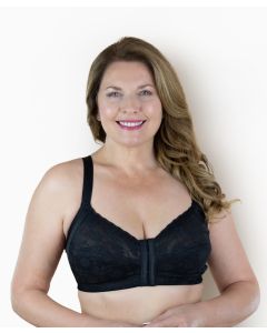 A blonde woman wearing a white Perfect Posture Bra with front fastener and lace detailing on the cups.