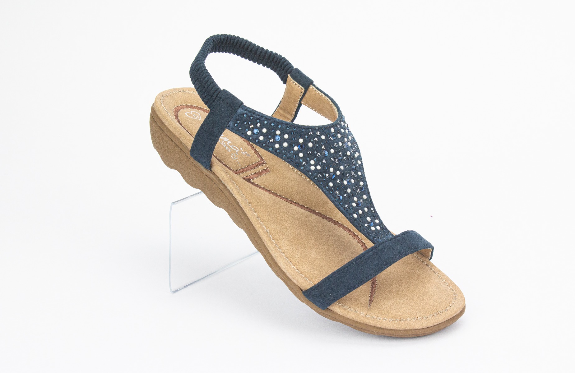 A pair of navy sandals with rhinestones.
