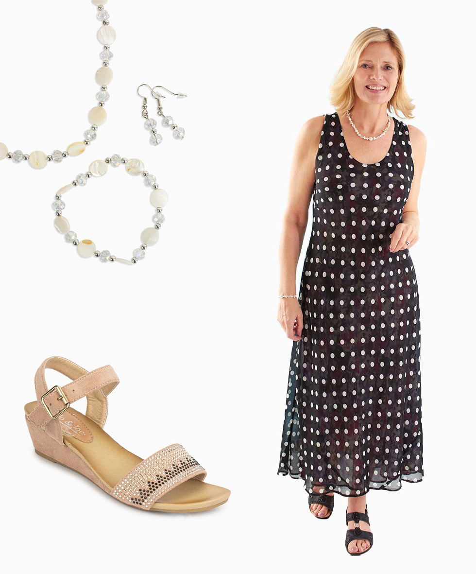 A black polka dot dress, some sandals and a jewellery set.